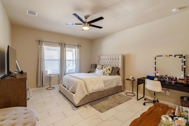 17020 Lathrop Ave, Pflugerville, TX 78660 - bedroom with a ceiling fan and a textured ceiling