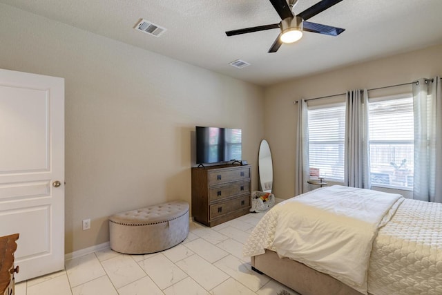 17020 Lathrop Ave, Pflugerville, TX 78660 - bedroom featuring light marble finish floors and ceiling fan