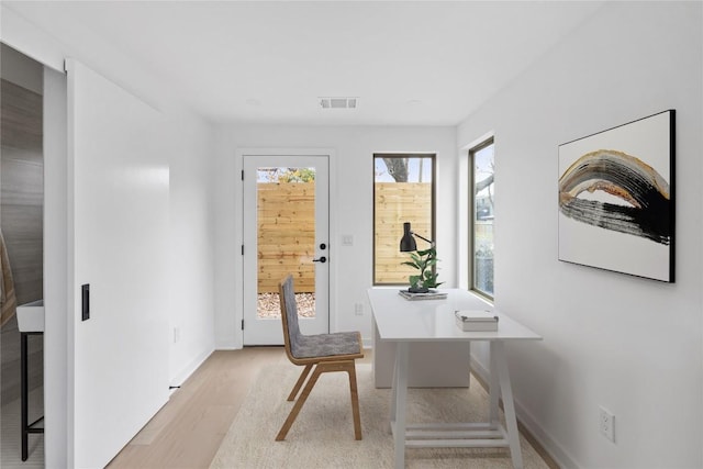 700 Denson Dr Unit 2101, Austin, TX 78752 - office with light wood-style flooring and baseboards