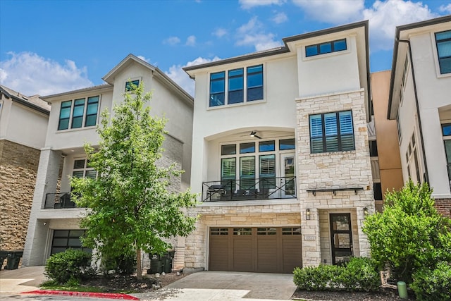 13322 Galleria Cir, Austin, TX 78738 - view of front of property with stone siding, stucco siding, concrete driveway, a garage, and a balcony