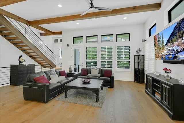 13322 Galleria Cir, Austin, TX 78738 - living room featuring beamed ceiling, light wood-type flooring, stairway, a ceiling fan, and recessed lighting