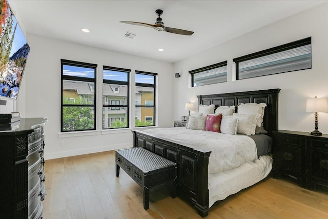 13322 Galleria Cir, Austin, TX 78738 - bedroom with light wood finished floors, recessed lighting, ceiling fan, and baseboards