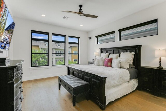 13322 Galleria Cir, Austin, TX 78738 - bedroom featuring light wood-type flooring, recessed lighting, and a ceiling fan