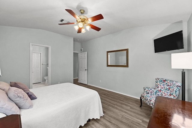 1803 Wallin Loop, Round Rock, TX 78664 - bedroom featuring vaulted ceiling, wood finished floors, baseboards, ensuite bathroom, and ceiling fan