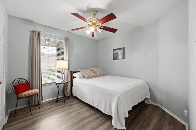 1803 Wallin Loop, Round Rock, TX 78664 - bedroom with wood finished floors, baseboards, and ceiling fan