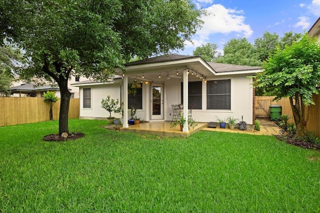 1803 Wallin Loop, Round Rock, TX 78664 - rear view of property featuring a patio area and stucco siding