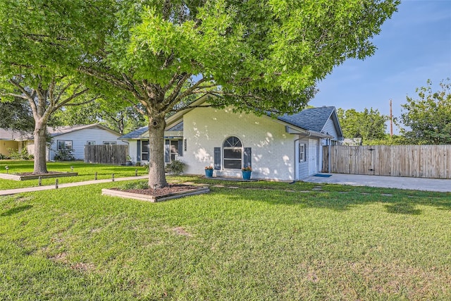 13301 Wisterwood St, Austin, TX 78729 - view of front of house featuring roof with shingles