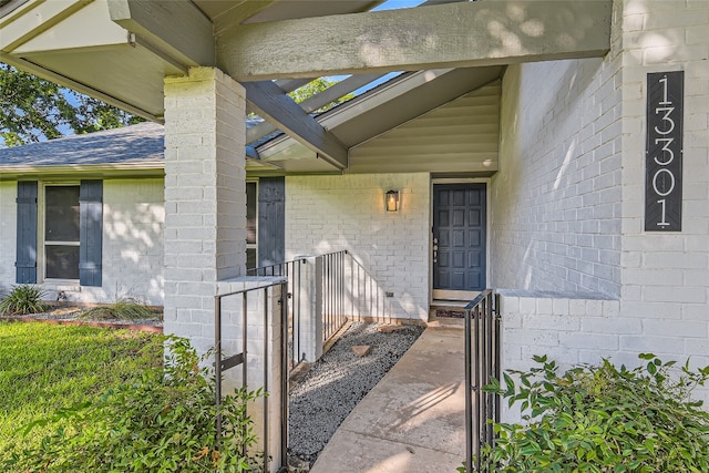 13301 Wisterwood St, Austin, TX 78729 - entrance to property featuring a shingled roof and brick siding