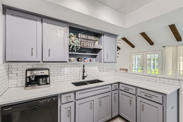 13301 Wisterwood St, Austin, TX 78729 - kitchen featuring black dishwasher, a sink, open shelves, and backsplash