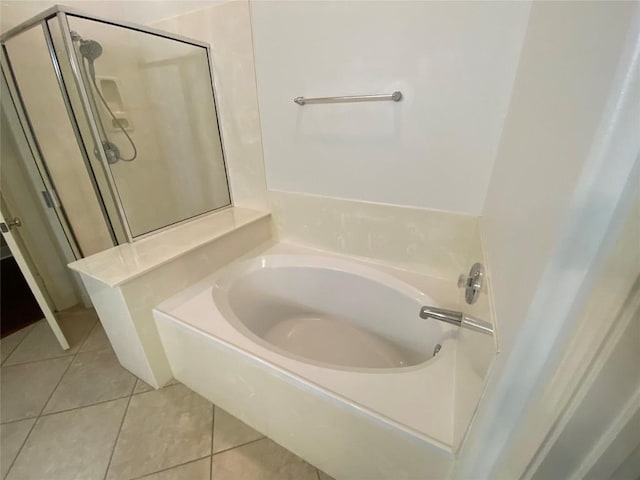 2210 Onion Creek Pkwy Unit 901, Austin, TX 78747 - bathroom with a garden tub, tile patterned floors, and a shower stall