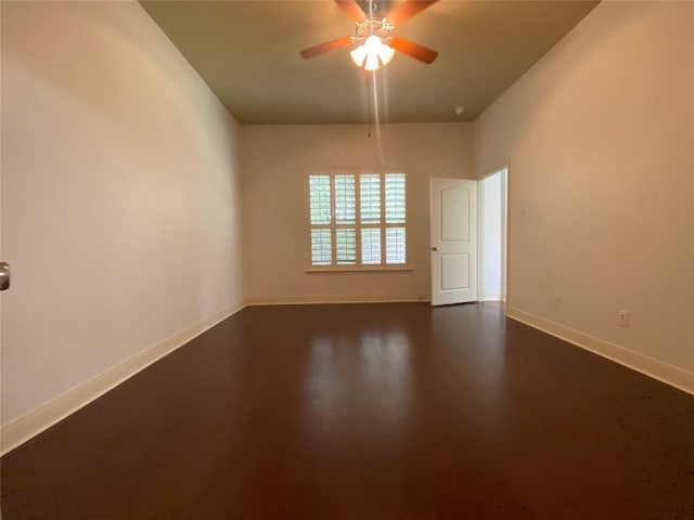 2210 Onion Creek Pkwy Unit 901, Austin, TX 78747 - unfurnished room featuring ceiling fan, baseboards, and dark wood-style flooring