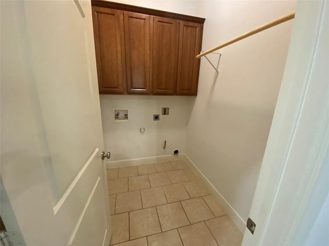 2210 Onion Creek Pkwy Unit 901, Austin, TX 78747 - washroom with hookup for a gas dryer, washer hookup, cabinet space, light tile patterned floors, and hookup for an electric dryer