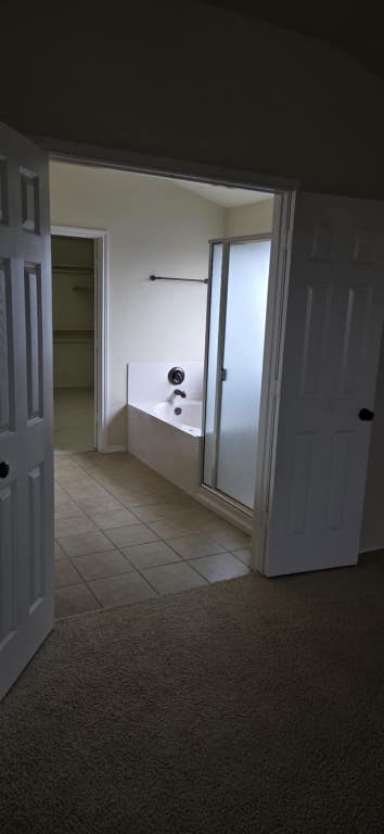 2302 N Ryan Dr, Copperas Cove, TX 76522 - full bathroom featuring tile patterned flooring and a garden tub