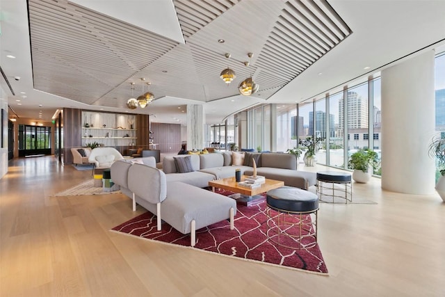 501 W Ave Unit 2303, Austin, TX 78701 - community lobby with floor to ceiling windows, a skyline view, and a towering ceiling