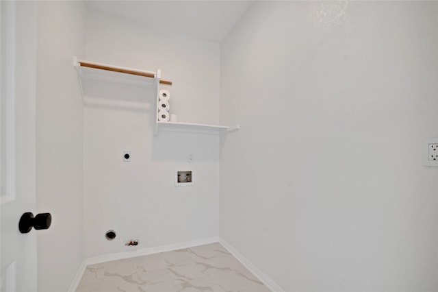 6601 Needham Ln, Austin, TX 78739 - washroom with washer hookup, light marble finish floors, gas dryer hookup, electric dryer hookup, and baseboards