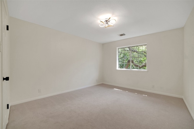 6601 Needham Ln, Austin, TX 78739 - spare room with carpet and baseboards