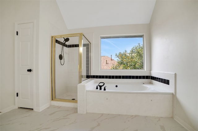6601 Needham Ln, Austin, TX 78739 - full bathroom with marble finish flooring, a garden tub, a stall shower, lofted ceiling, and baseboards