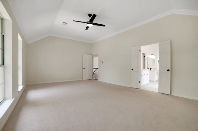 6601 Needham Ln, Austin, TX 78739 - unfurnished bedroom featuring vaulted ceiling, light colored carpet, baseboards, ornamental molding, and a ceiling fan