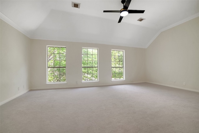 6601 Needham Ln, Austin, TX 78739 - carpeted empty room with vaulted ceiling, ornamental molding, baseboards, and a ceiling fan