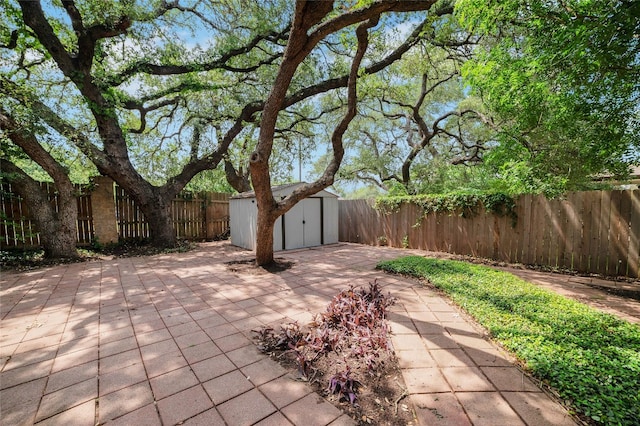 6601 Needham Ln, Austin, TX 78739 - fenced backyard with a patio area
