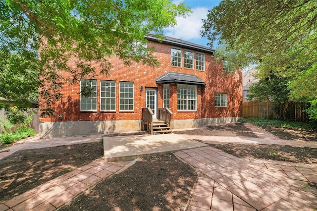 6601 Needham Ln, Austin, TX 78739 - back of house featuring brick siding
