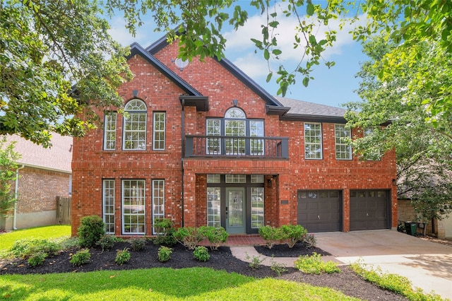 6601 Needham Ln, Austin, TX 78739 - colonial inspired home with brick siding, driveway, a garage, and a front yard