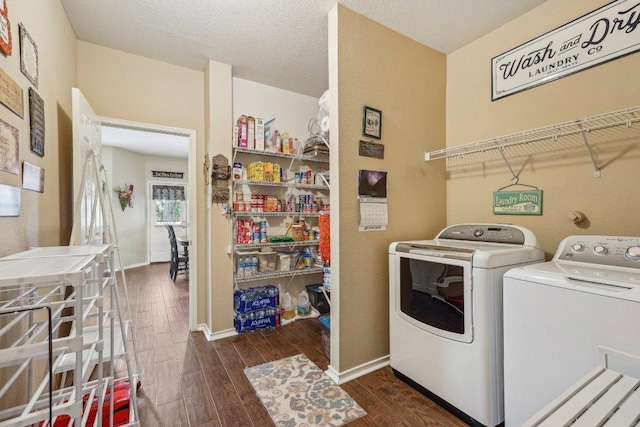 3502 Blackstone Run, San Antonio, TX 78259 - laundry room featuring separate washer and dryer, dark wood-style flooring, and baseboards
