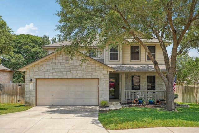 3502 Blackstone Run, San Antonio, TX 78259 - view of front of home featuring a porch, stone siding, concrete driveway, and an attached garage