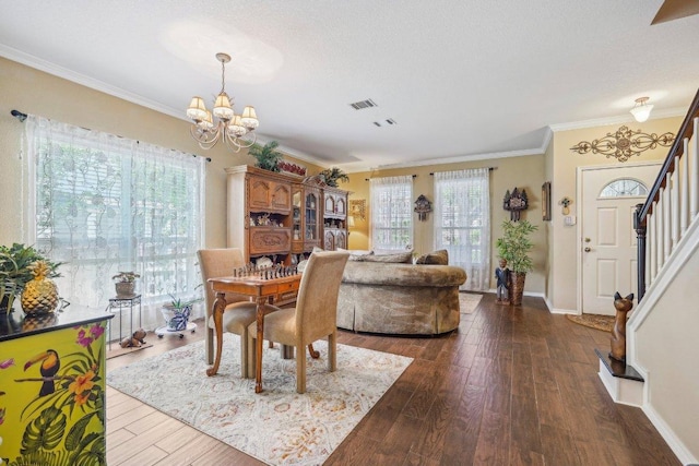 3502 Blackstone Run, San Antonio, TX 78259 - dining room featuring a chandelier, stairs, dark wood-style floors, ornamental molding, and baseboards