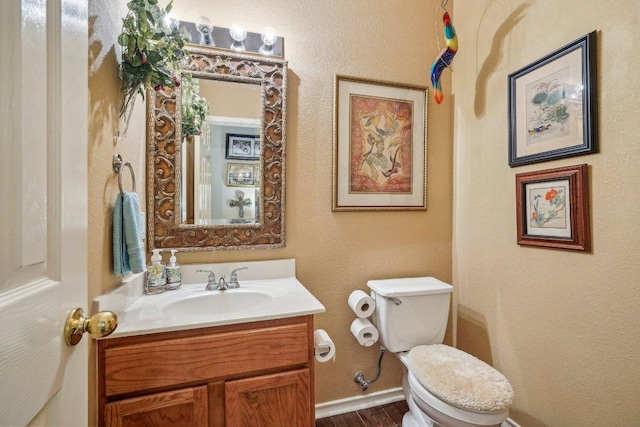 3502 Blackstone Run, San Antonio, TX 78259 - half bath with vanity, toilet, and wood finished floors