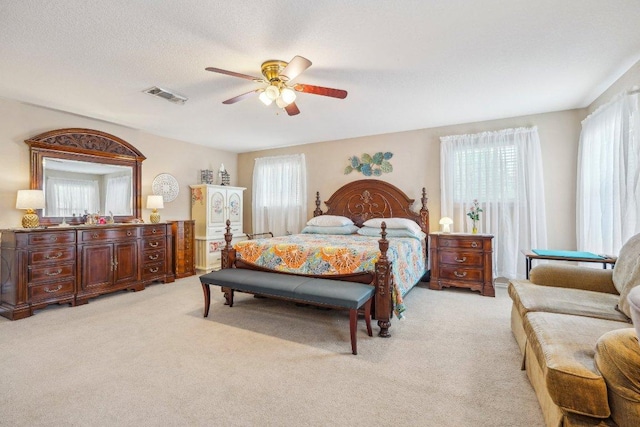 3502 Blackstone Run, San Antonio, TX 78259 - bedroom with light colored carpet and a ceiling fan