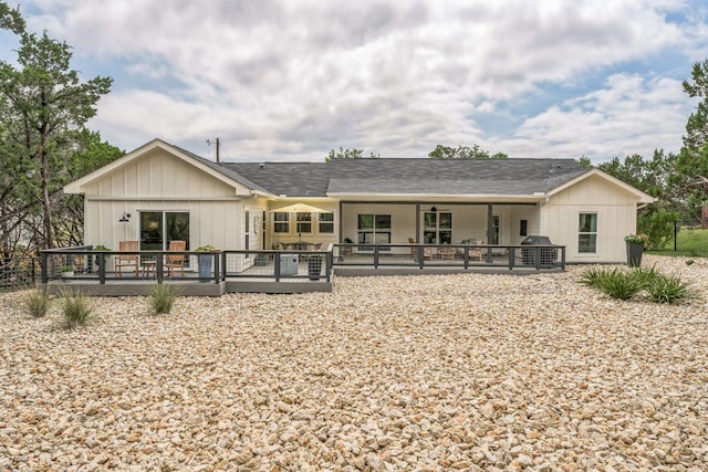 1174 Desiree St, Canyon Lake, TX 78133 - back of house with a wooden deck and board and batten siding
