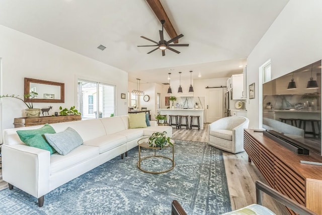 1174 Desiree St, Canyon Lake, TX 78133 - living area with light wood-style floors, ceiling fan, beam ceiling, and high vaulted ceiling