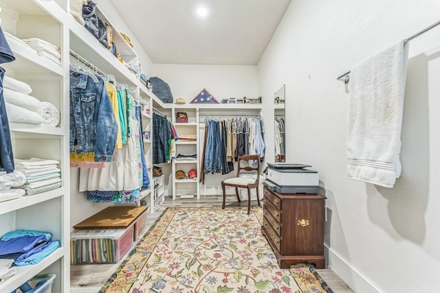 1174 Desiree St, Canyon Lake, TX 78133 - spacious closet featuring wood finished floors
