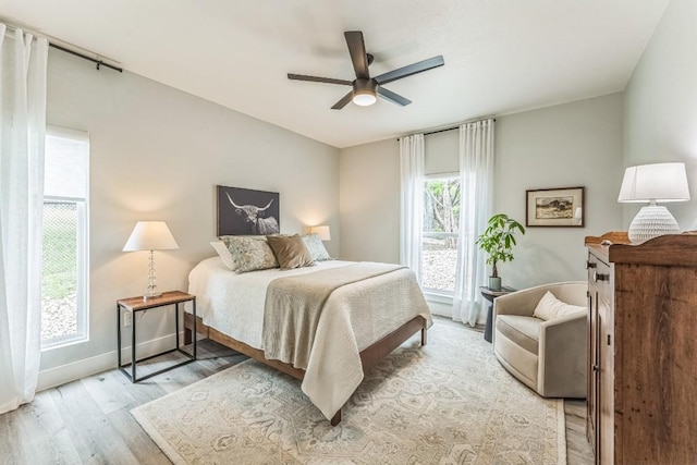 1174 Desiree St, Canyon Lake, TX 78133 - bedroom featuring light wood-type flooring and ceiling fan