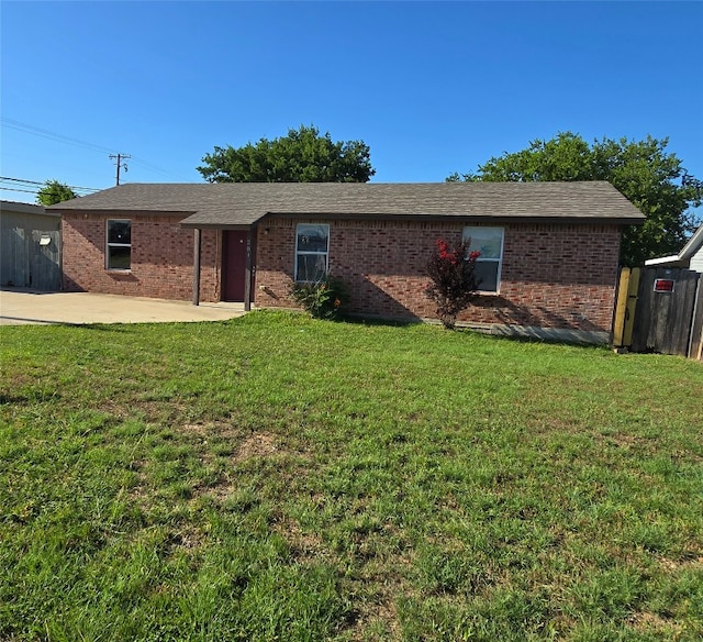 201 Clore Rd, Harker Heights, TX 76548 - ranch-style home featuring brick siding and a patio