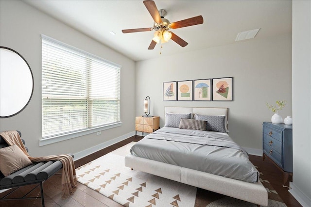9305 Mcknight Loop Unit 4, Austin, TX 78717 - bedroom with baseboards and a ceiling fan