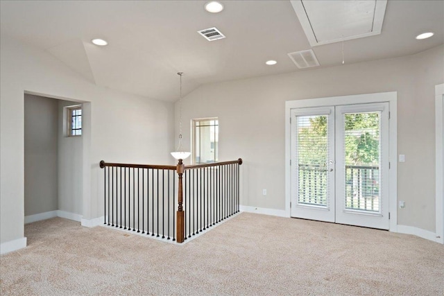 9305 Mcknight Loop Unit 4, Austin, TX 78717 - empty room with attic access, carpet, baseboards, vaulted ceiling, and recessed lighting