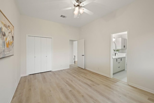 21017 Secretariat Ridge Ln, Pflugerville, TX 78660 - unfurnished bedroom featuring light wood-style flooring, baseboards, and a closet