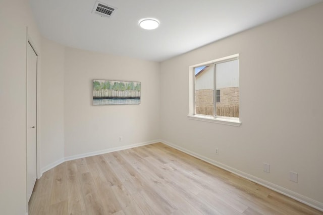 21017 Secretariat Ridge Ln, Pflugerville, TX 78660 - empty room with light wood-style flooring and baseboards