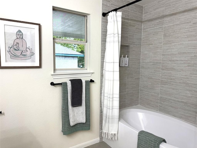 21017 Secretariat Ridge Ln, Pflugerville, TX 78660 - bathroom with shower / bath combination with curtain and baseboards