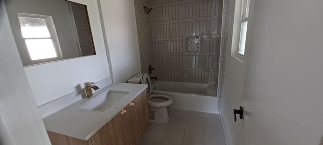2101 Vanderbilt Ln, Austin, TX 78723 - bathroom with toilet, vanity, and tub / shower combination