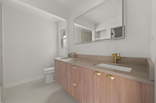 2101 Vanderbilt Ln, Austin, TX 78723 - bathroom with double vanity and tile patterned flooring