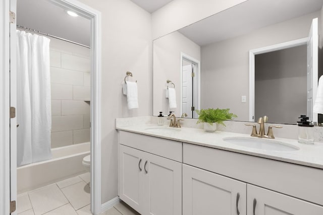 299 Diamond Point Dr, Dripping Springs, TX 78620 - full bath with double vanity, tile patterned floors, and shower / bathtub combination with curtain