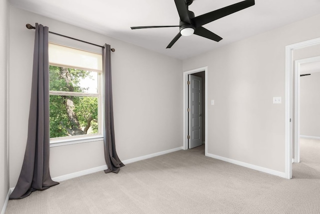 299 Diamond Point Dr, Dripping Springs, TX 78620 - empty room featuring light colored carpet, plenty of natural light, and ceiling fan