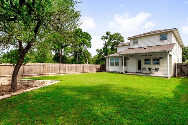 299 Diamond Point Dr, Dripping Springs, TX 78620 - back of house featuring a patio area, a fenced backyard, ceiling fan, and roof with shingles