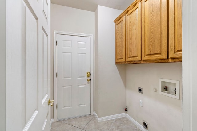 9501 Aire Libre Dr, Austin, TX 78726 - washroom with hookup for a gas dryer, cabinet space, hookup for a washing machine, hookup for an electric dryer, and light tile patterned floors