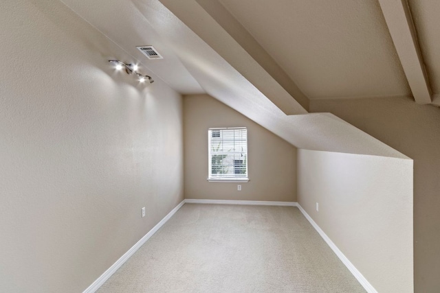 9501 Aire Libre Dr, Austin, TX 78726 - bonus room with lofted ceiling, carpet floors, and baseboards