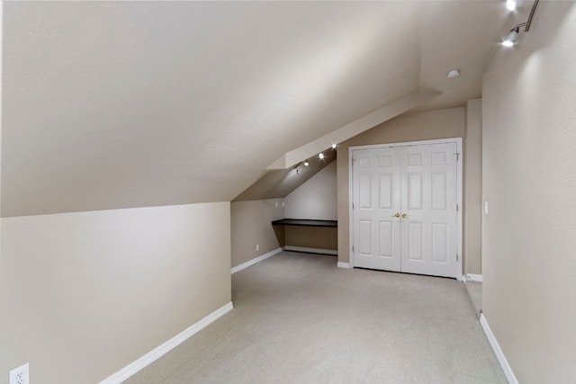 9501 Aire Libre Dr, Austin, TX 78726 - bonus room featuring lofted ceiling, light colored carpet, and baseboards