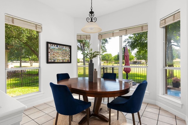 10833 Olympia Fields Loop, Austin, TX 78747 - dining area with light tile patterned floors and baseboards
